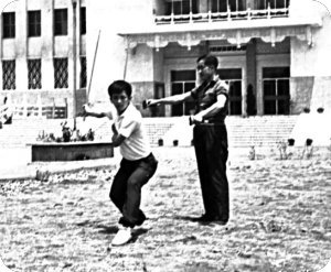 Dr. Yang learning Double Sword from Grandmaster Li at Tamkang College